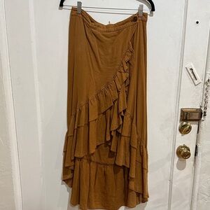 Free People Asymmetrical Ruffle Skirt in burnt orange. Linen blend